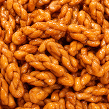 Crispy Mini Twisted Dough Snacks Individually Wrapped And Available in Brown Sugar Or Salt-And-Pepper Flavors Perfect for Snacking at Home While Binge-Watching Shows